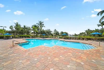 Pooldeck with a large outdoor pool